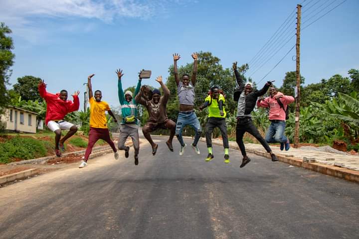 A youth group celebrating together outdoors