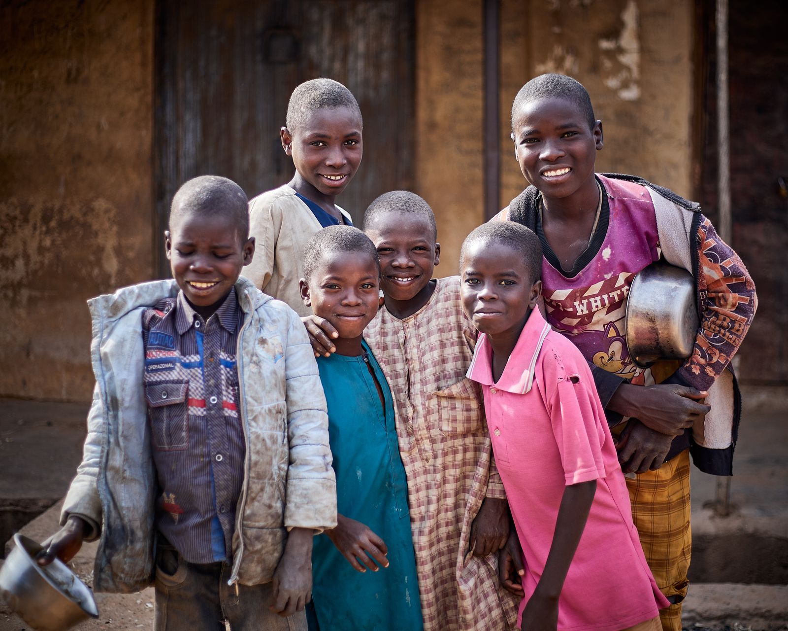 A group of children standing together outdoors