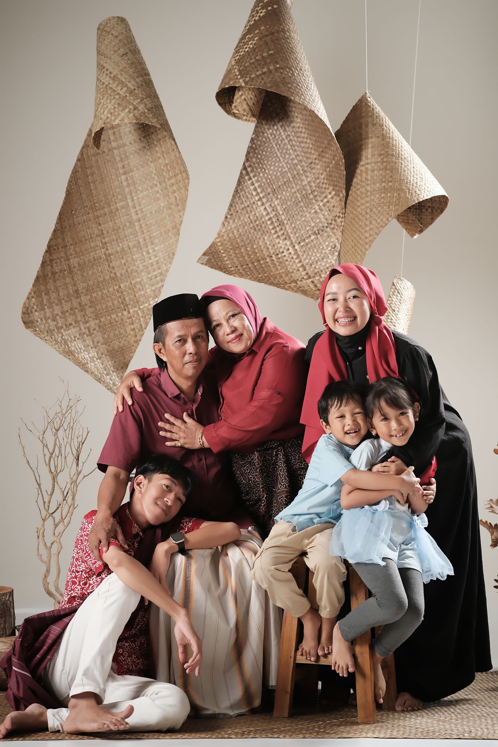 A family spending time together indoors and smiling