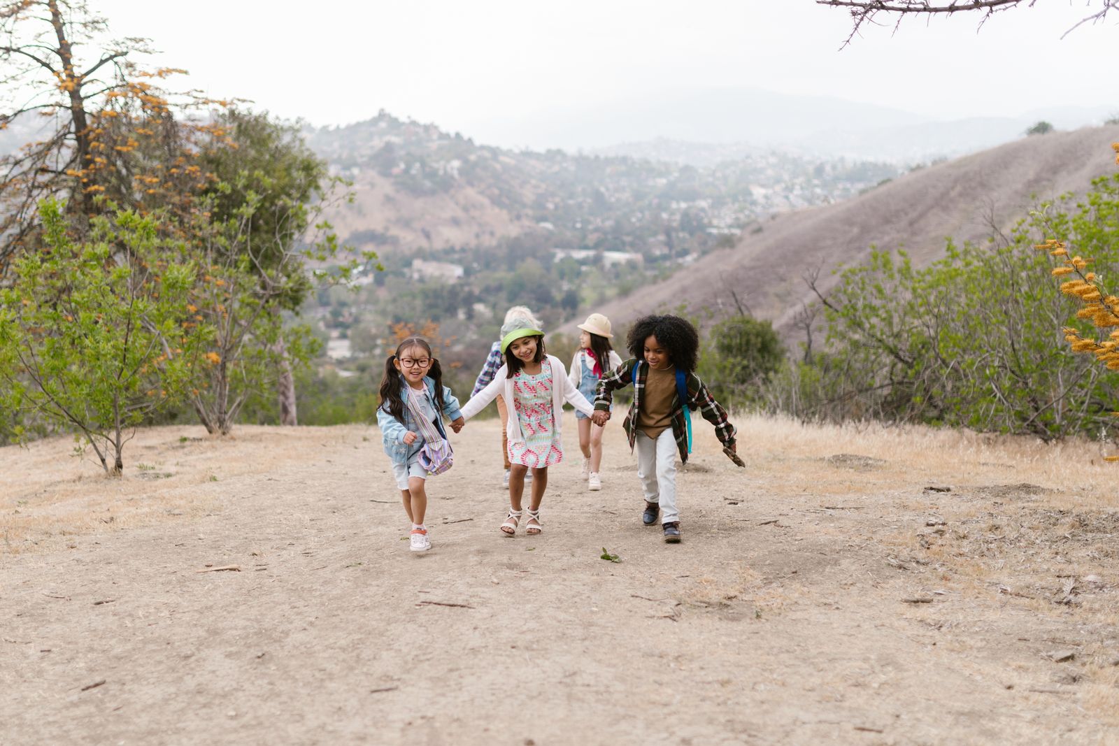 A youth group celebrating together outdoors